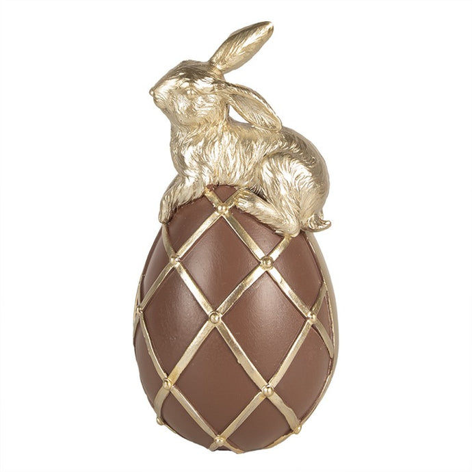 Hase auf Schokoladenei, braun gold